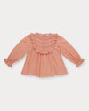 Early Sunday, Lauren Blouse in Blush, made from Cotton Jeera Dobby Voile fabric, featuring layered lace-trimmed ruffles and delicate pintuck detailing on the yoke, shown in a front flat-lay view
