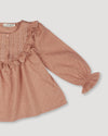 Early Sunday, Lauren Blouse in Earthy Pink, made from Cotton Swiss Dobby fabric, featuring relaxed fit with a floral embroidered yoke, shown in a closeup flat-lay view