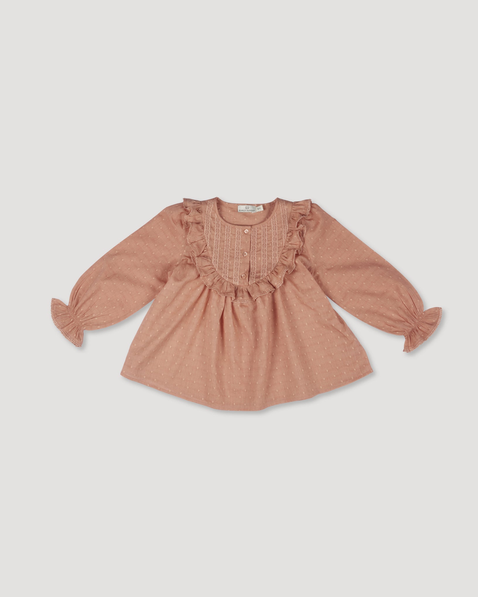 Early Sunday, Lauren Blouse in Earthy Pink, made from Cotton Swiss Dobby fabric, featuring relaxed fit with a floral embroidered yoke, shown in a front flat-lay view