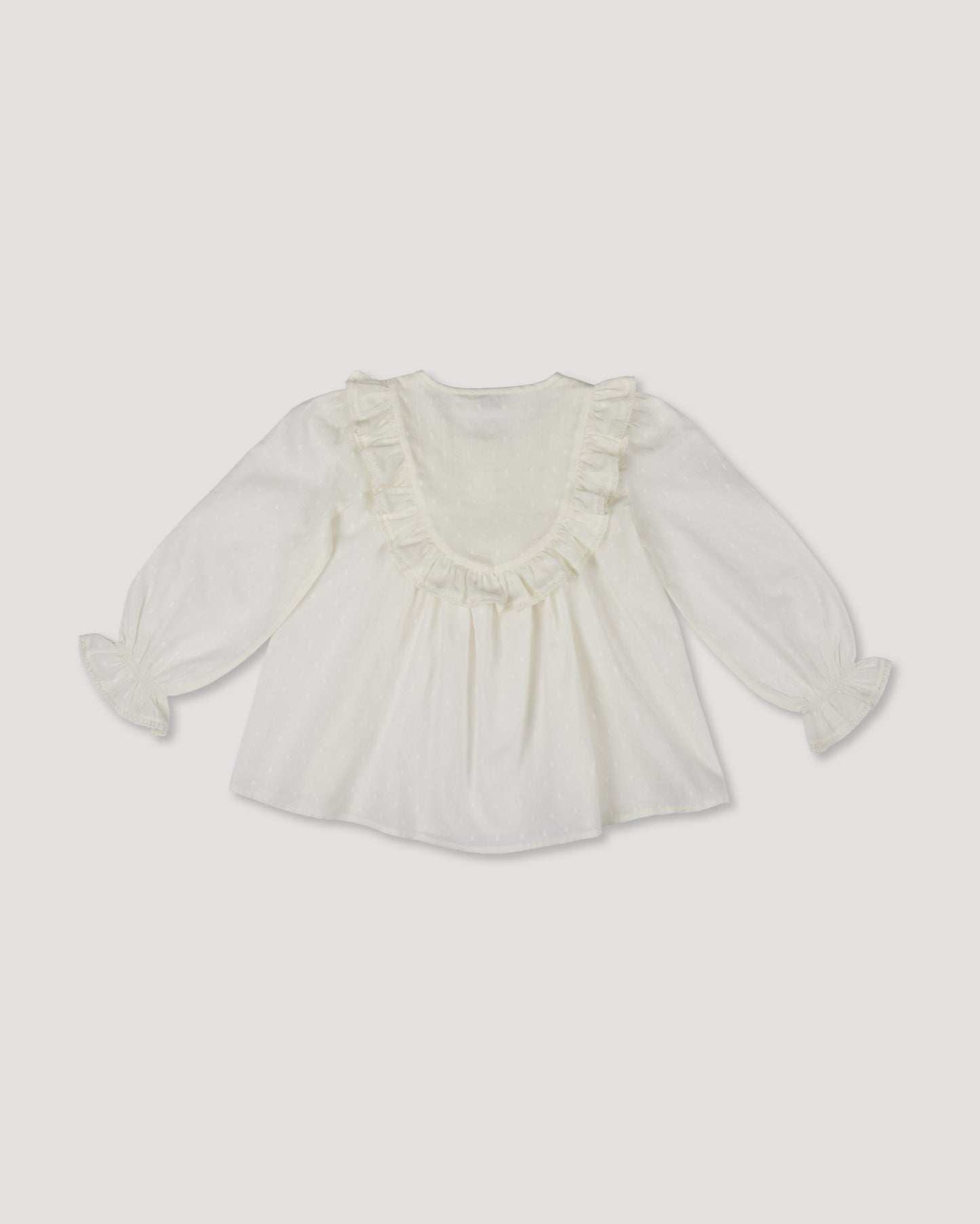 Early Sunday, Lauren Blouse in Ecru, made from Cotton Swiss Dobby fabric, featuring relaxed fit with a floral embroidered yoke, shown in a back flat-lay view