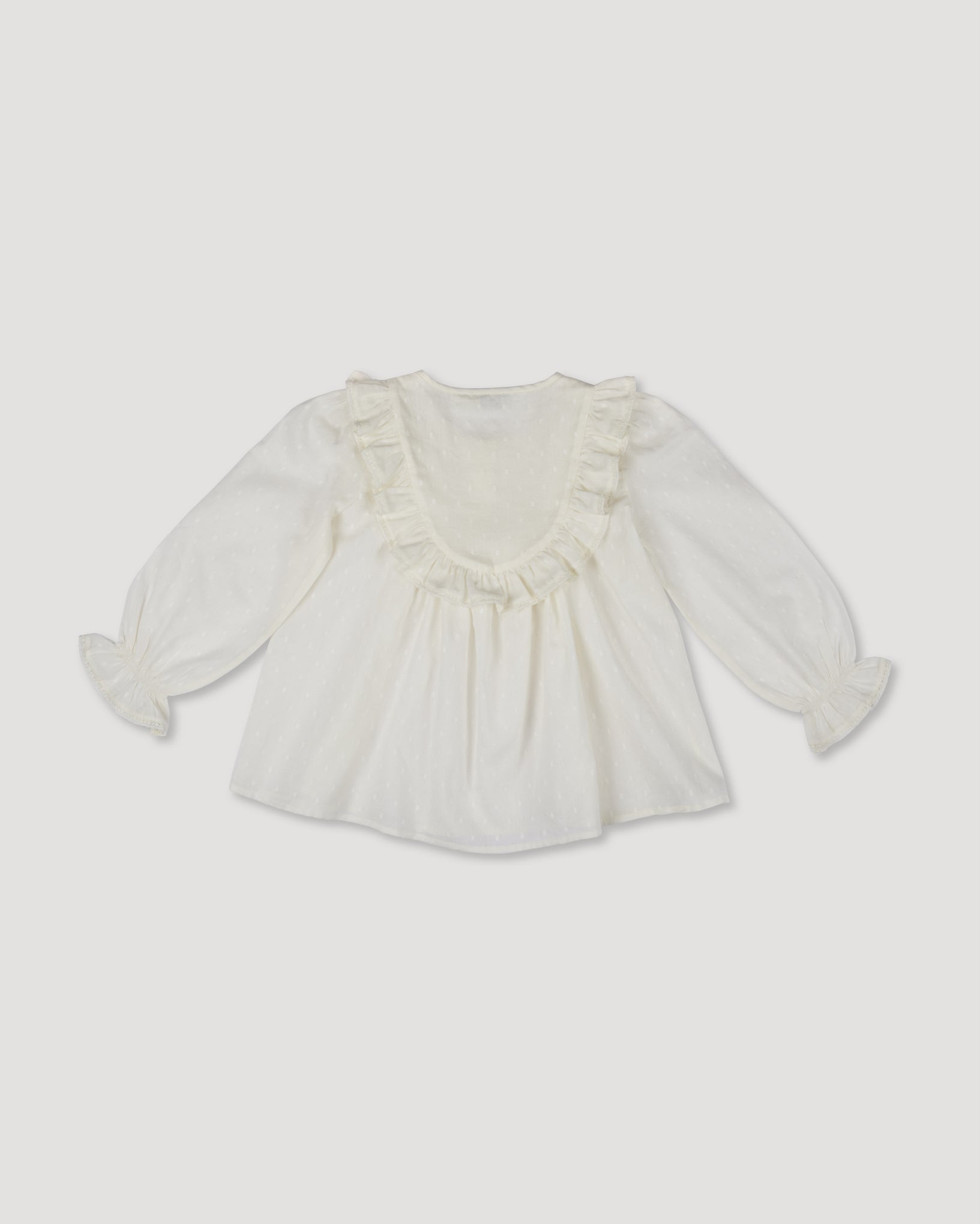 Early Sunday, Lauren Blouse in Ecru, made from Cotton Swiss Dobby fabric, featuring relaxed fit with a floral embroidered yoke, shown in a back flat-lay view