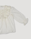 Early Sunday, Lauren Blouse in Ecru, made from Cotton Swiss Dobby fabric, featuring relaxed fit with a floral embroidered yoke, shown in a closeup flat-lay view
