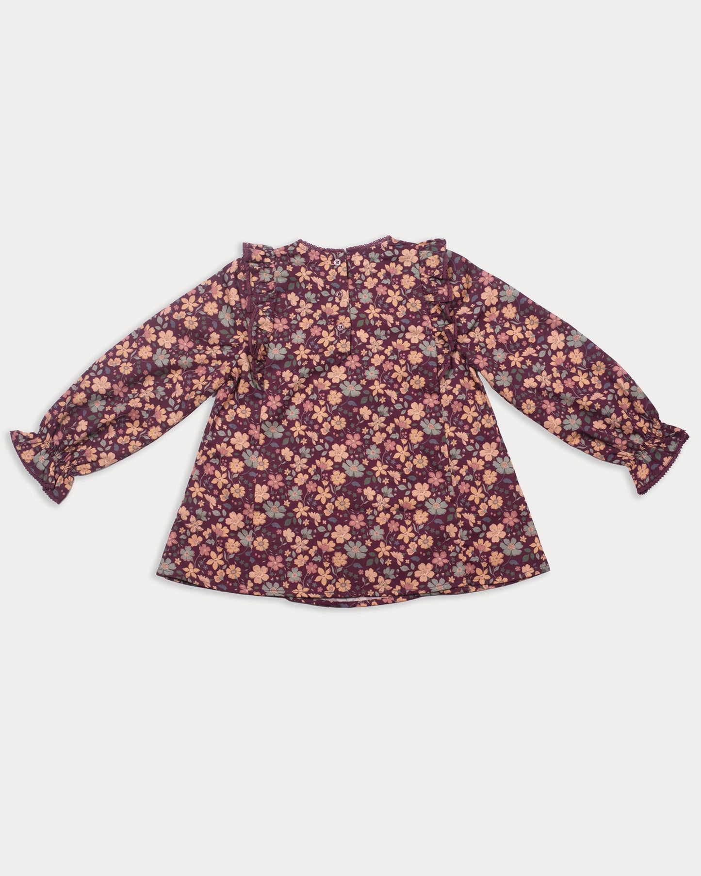 Early Sunday, Lauren Blouse in Plum, made from Printed Cotton Satin fabric, featuring layered lace-trimmed ruffles and delicate pintuck detailing on the yoke, shown in a back flat-lay view