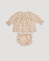 Early Sunday, Libby Baby Dress & Bloomer Set in Ditsy Bouquet Cream print color, made from Printed Viscose Rayon Twill fabric, featuring long sleeves with frilly neck & floral print, shown in a front flat-lay view
