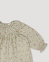 Early Sunday, Libby Baby Dress & Bloomer Set in Ditsy Bouquet Jade print, made from Printed Viscose Rayon Twill fabric, featuring long sleeves with frilly neck & floral print, shown in a closeup flat-lay view