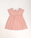 Early Sunday, Lila Dress in Peony color, made from 100% cotton gingham checks fabric, featuring Scalloped neckline with contrast stitching, flutter sleeves, gentle gathers, and embroidered hem detail, shown in a back flat-lay view