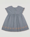 Early Sunday, Lila Dress in Ocean Blue color, made from Canvas 70% Cotton 30% Linen fabric, featuring a flattering mini dress with a relaxed fit, designed for comfort and effortless style, shown in back flat-lay view