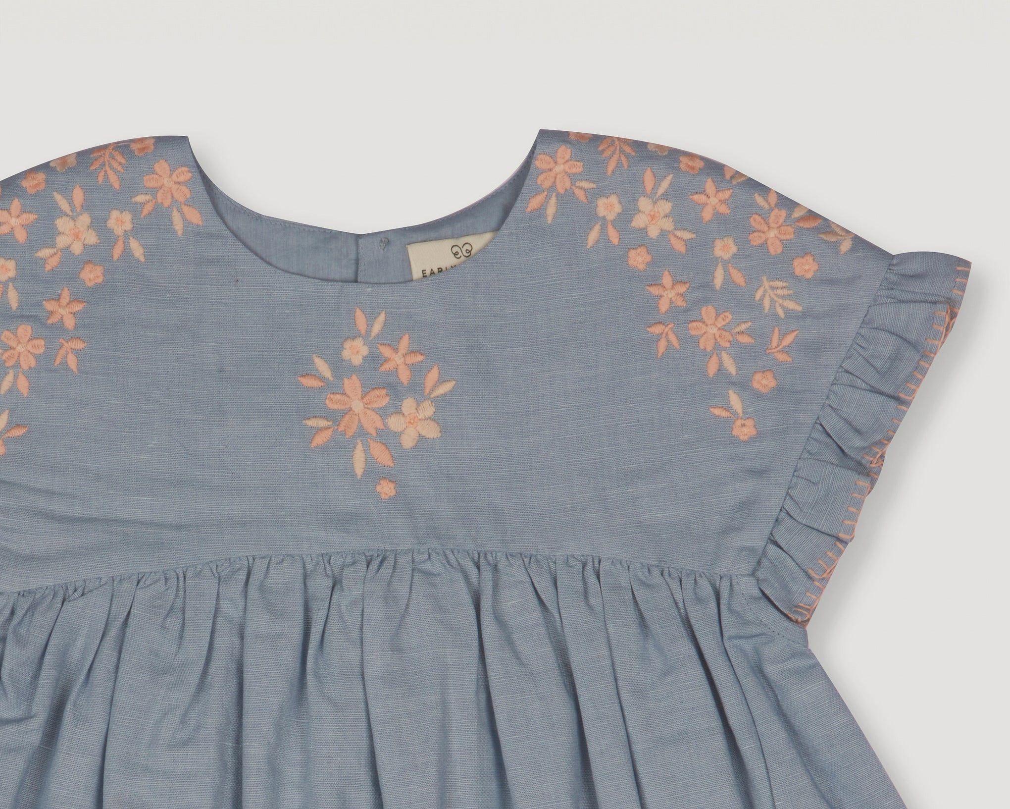 Early Sunday, Lila Dress in Ocean Blue color, made from Canvas 70% Cotton 30% Linen fabric, featuring a flattering mini dress with a relaxed fit, designed for comfort and effortless style, shown in closeup flat-lay view