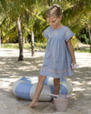 Early Sunday, Lila Dress in Ocean Blue color, made from Canvas 70% Cotton 30% Linen fabric, featuring a flattering mini dress with a relaxed fit, designed for comfort and effortless style, shown in a front view of model wearing it