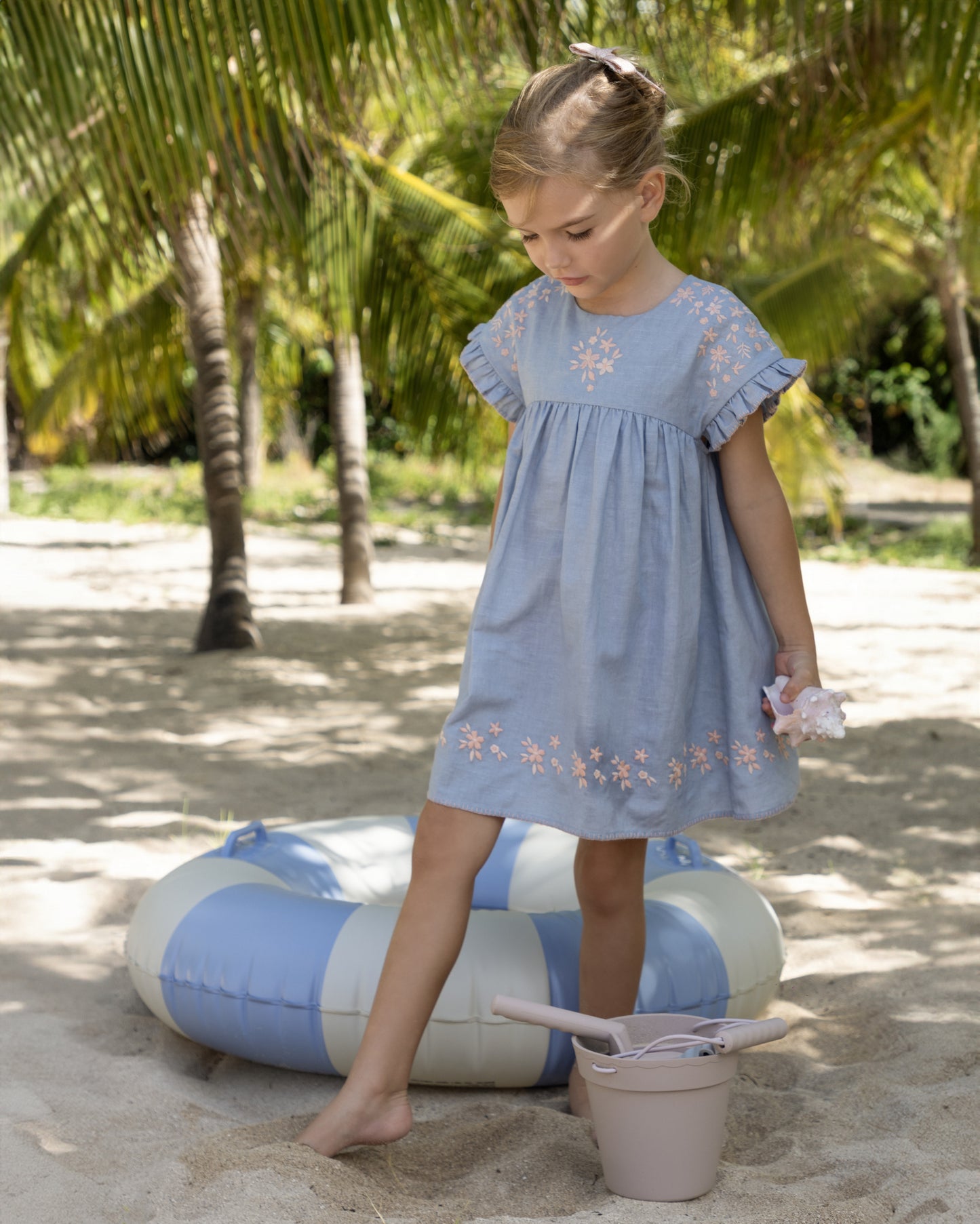 Early Sunday, Lila Dress in Ocean Blue color, made from Canvas 70% Cotton 30% Linen fabric, featuring a flattering mini dress with a relaxed fit, designed for comfort and effortless style, shown in a front view of model wearing it