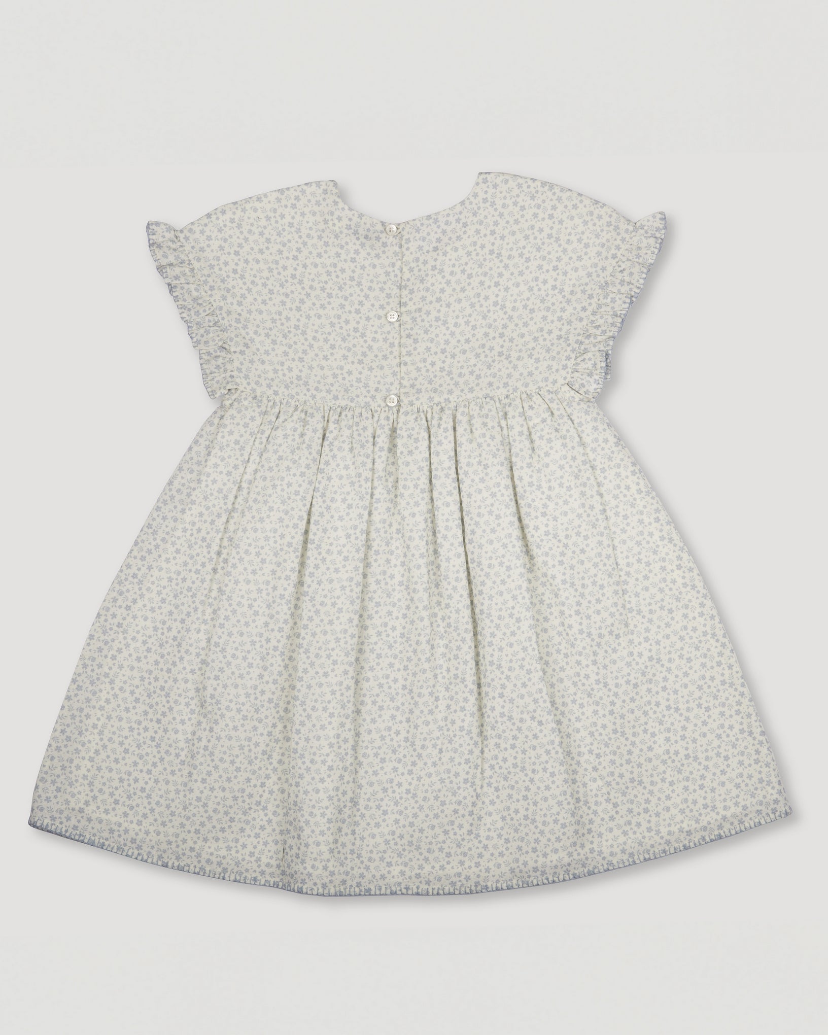 Early Sunday, Lila Dress in Mini Flower print, made from Printed canvas 70% Cotton 30% Linen fabric, featuring a flattering mini dress with a relaxed fit, designed for comfort and effortless style, shown in a back flat-lay view