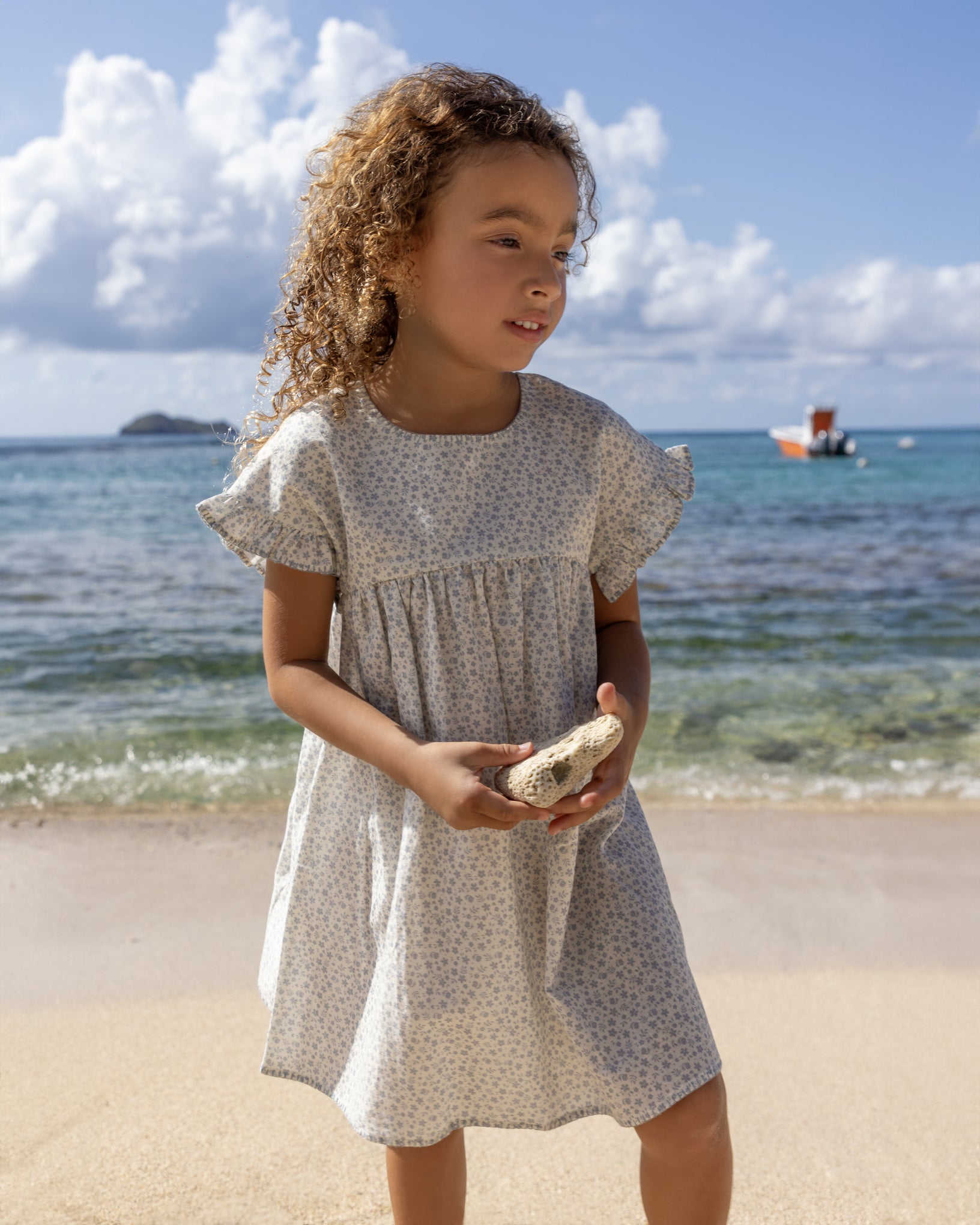 Early Sunday, Lila Dress in Mini Flower print, made from Printed canvas 70% Cotton 30% Linen fabric, featuring a flattering mini dress with a relaxed fit, designed for comfort and effortless style, shown in a front view of model wearing it