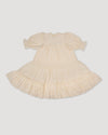 Early Sunday, Lilly Dress in Hazelnut Cream, made from All-Over Embroidered Cotton Cambric fabric, featuring Delicate floral embroidery placed softly across the dress for a timeless, heirloom-inspired finish, shown in a back flat-lay view