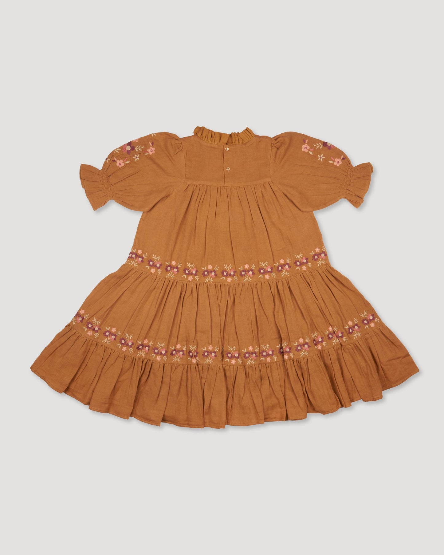 Early Sunday, Lilly Dress in Almond, made from Dyed Cotton Double Gauze fabric, featuring Delicate floral embroidery placed softly across the dress for a timeless, heirloom-inspired finish, shown in a back flat-lay view