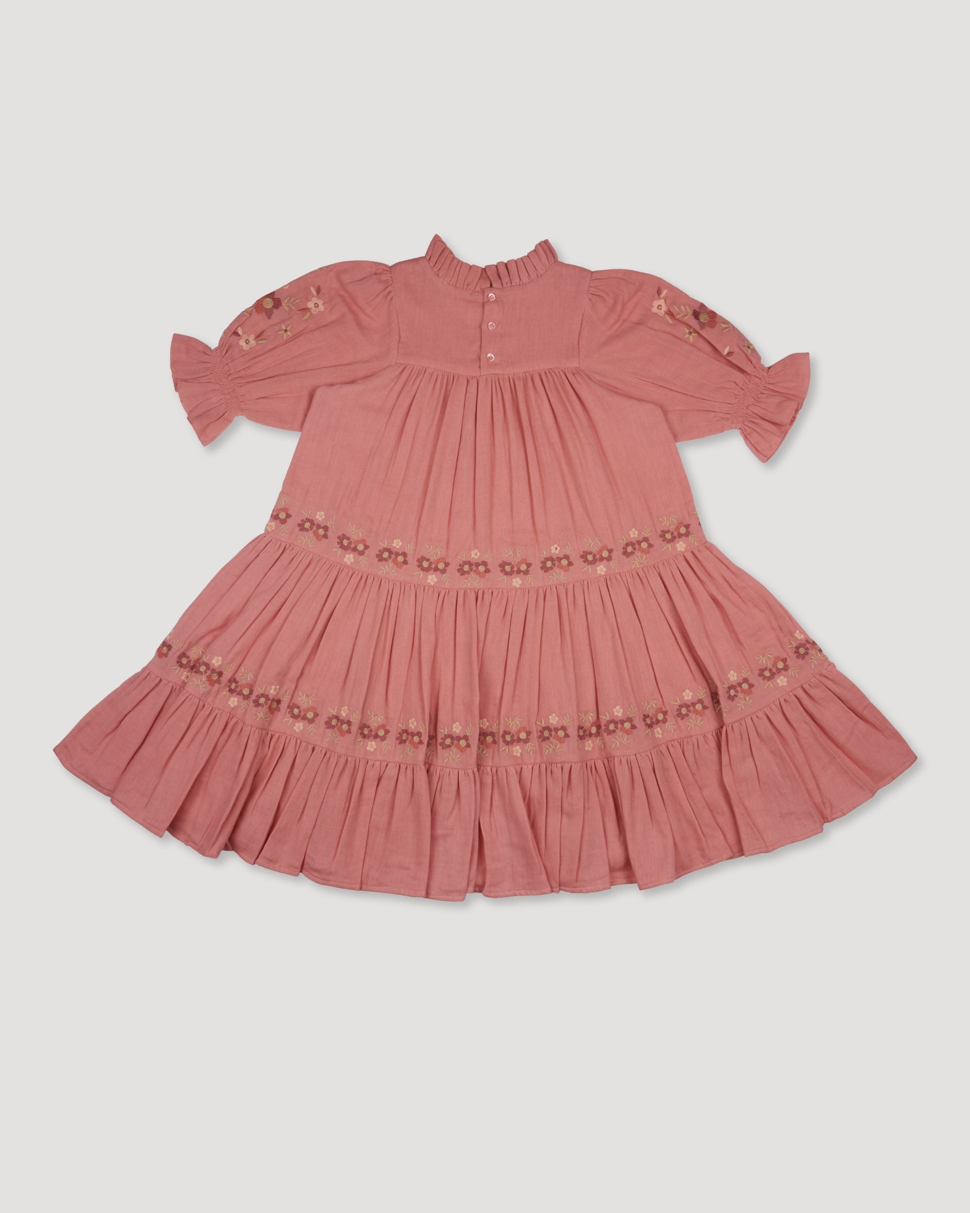 Early Sunday, Lilly Dress in Rose, made from Dyed Cotton Double Gauze fabric, featuring Delicate floral embroidery placed softly across the dress for a timeless, heirloom-inspired finish, shown in a back flat-lay view
