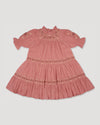 Early Sunday, Lilly Dress in Rose, made from Dyed Cotton Double Gauze fabric, featuring Delicate floral embroidery placed softly across the dress for a timeless, heirloom-inspired finish, shown in a front flat-lay view