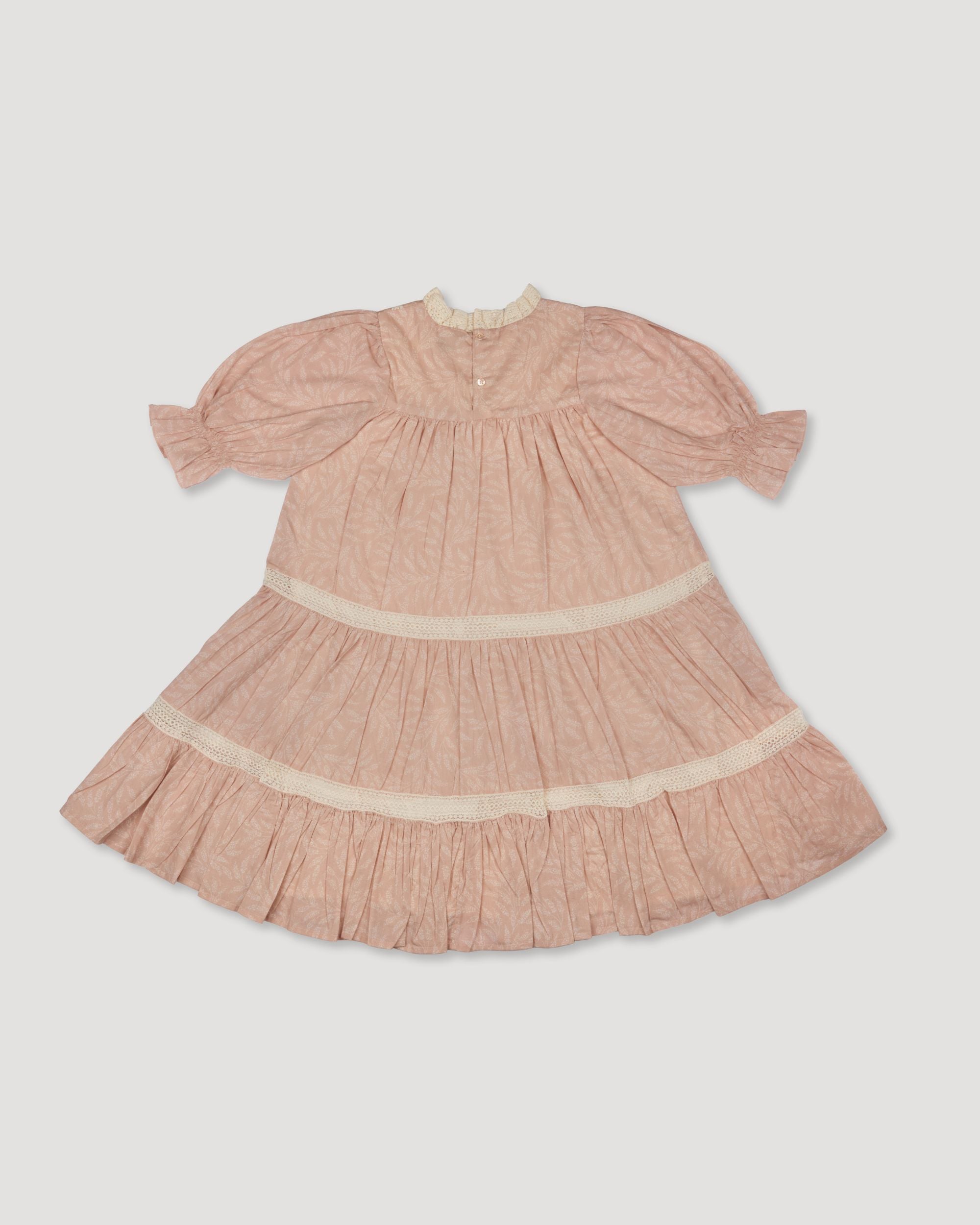 Early Sunday, Lilly Dress in Feather print, made from Printed Cotton Cambric fabric, featuring Delicate floral embroidery placed softly across the dress for a timeless, heirloom-inspired finish, shown in a back flat-lay view