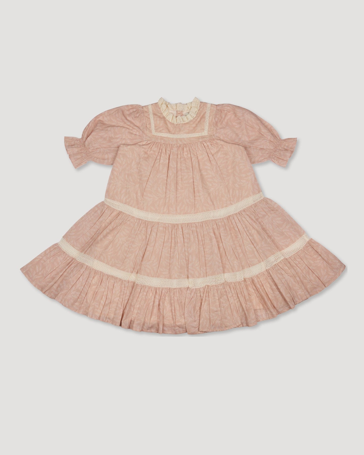 Early Sunday, Lilly Dress in Feather print, made from Printed Cotton Cambric fabric, featuring Delicate floral embroidery placed softly across the dress for a timeless, heirloom-inspired finish, shown in a front flat-lay view