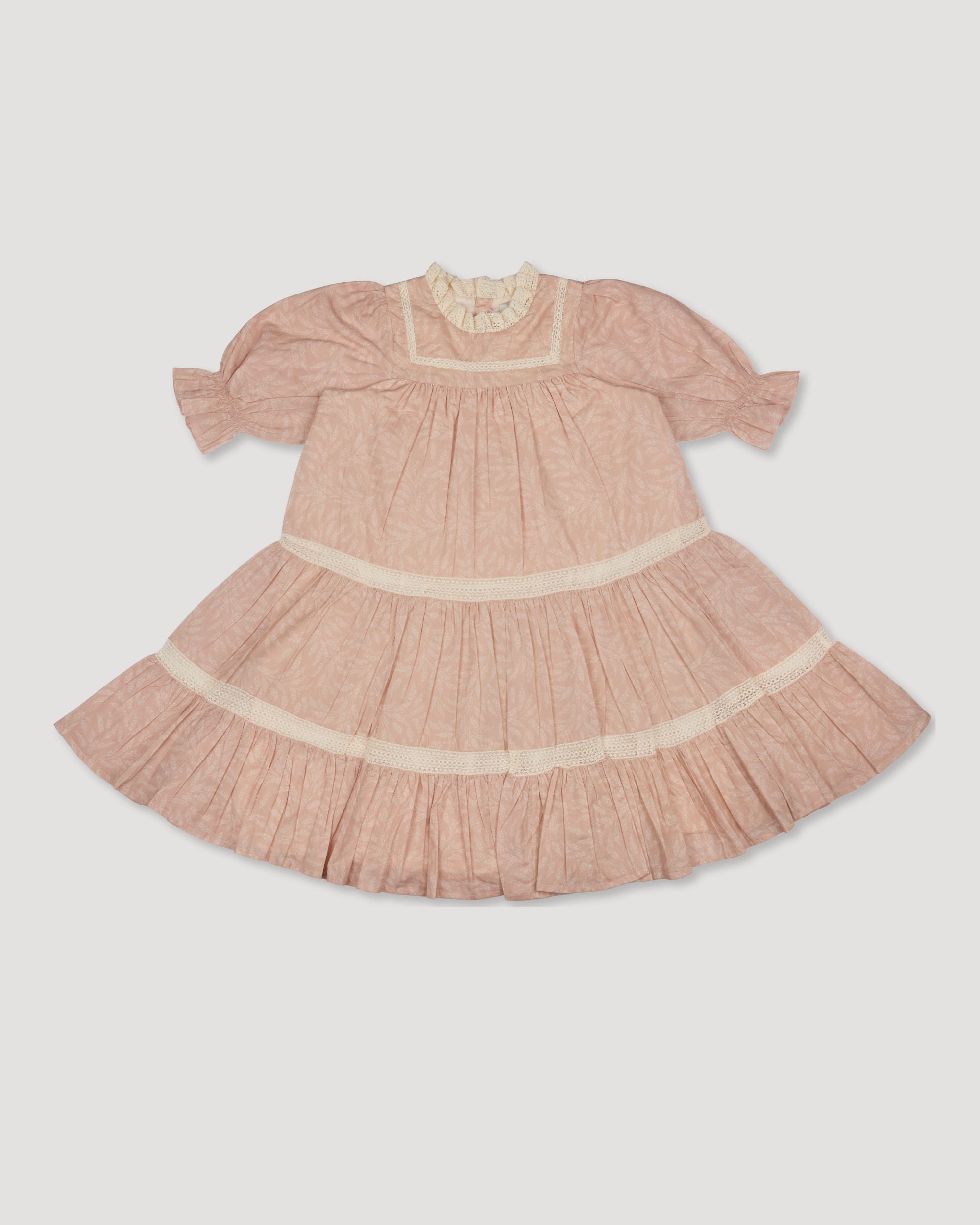 Early Sunday, Lilly Dress in Feather print, made from Printed Cotton Cambric fabric, featuring Delicate floral embroidery placed softly across the dress for a timeless, heirloom-inspired finish, shown in a front flat-lay view