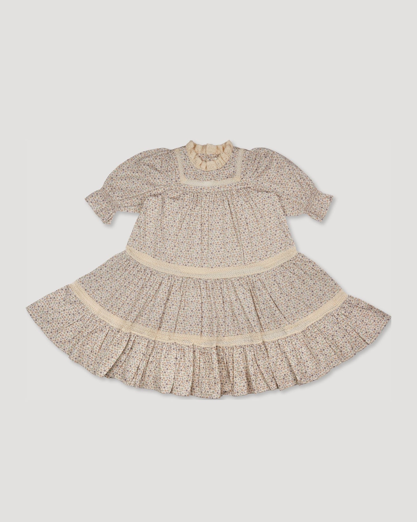 Early Sunday, Lilly Dress in Miny Flowers print, made from Printed Cotton Satin fabric, featuring Delicate floral embroidery placed softly across the dress for a timeless, heirloom-inspired finish, shown in a front flat-lay view