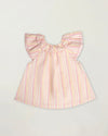 Early Sunday, Lola Blouse in Pink Stripes color, made from printed 70% cotton 30% linen fabric, featuring Ruffled neckline, flutter sleeves with contrast detailing, and gentle gathers for a sweet silhouette, shown in a back flat-lay view