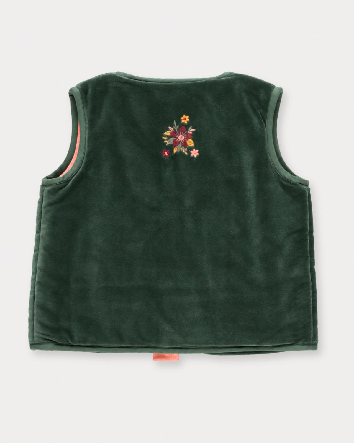 Early Sunday, Lou Vest jacket in Forest Green, made from Cotton Velvet Velour's fabric, featuring sleeveless quilted silhouette with tie-up bow and floral embroidery, shown in a back flat-lay view