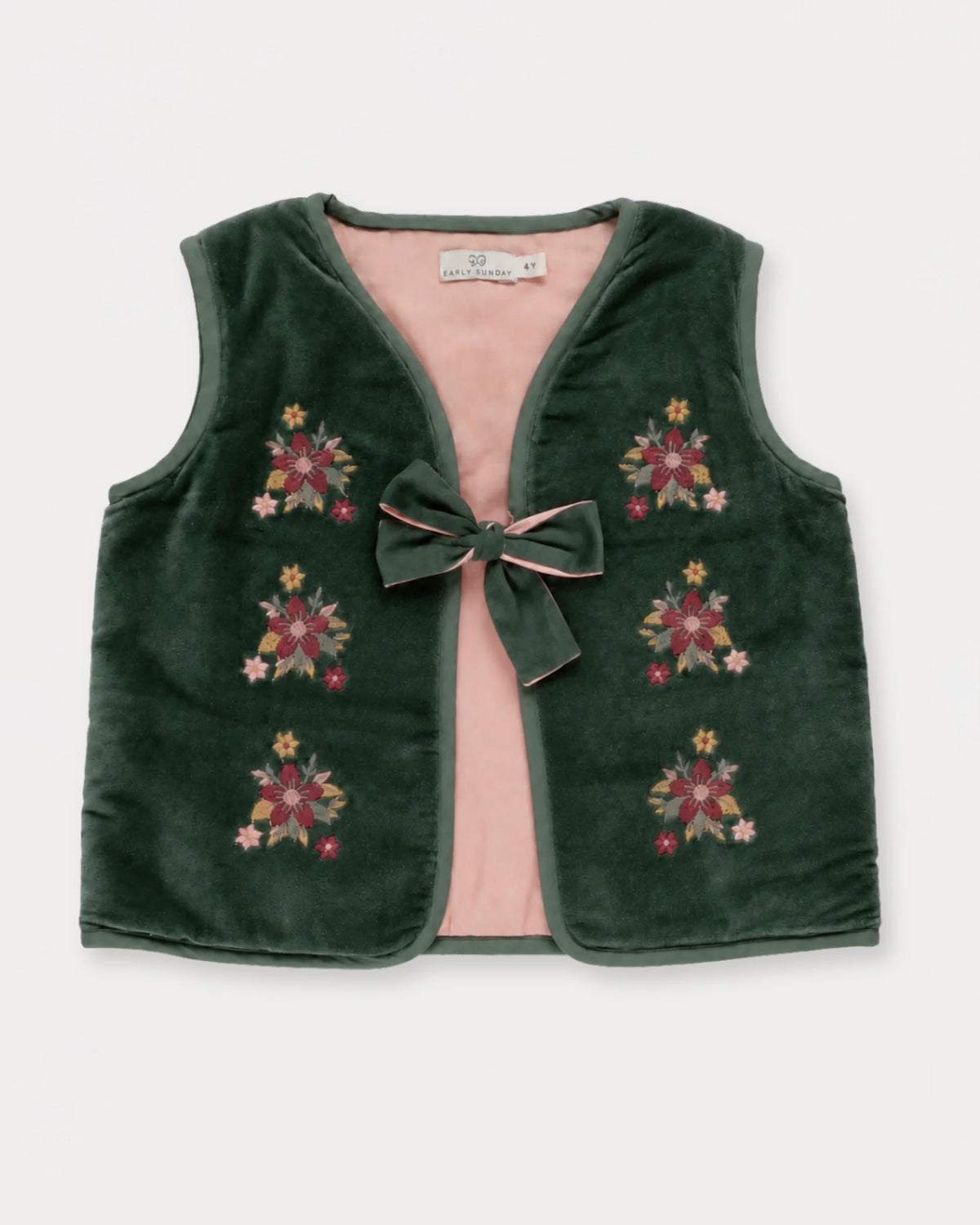 Early Sunday, Lou Vest jacket in Forest Green, made from Cotton Velvet Velour's fabric, featuring sleeveless quilted silhouette with tie-up bow and floral embroidery, shown in a front flat-lay view