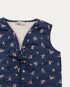 Early Sunday, Lou Vest jacket in Ditsy Bouquet Navy, made from Printed Cotton Satin fabric, featuring sleeveless quilted silhouette with tie-up bow detailing, shown in a closeup flat-lay view