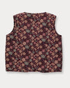 Early Sunday, Lou Vest jacket in Plum, made from Printed Cotton Satin fabric, featuring sleeveless quilted silhouette with tie-up bow detailing, shown in a back flat-lay view