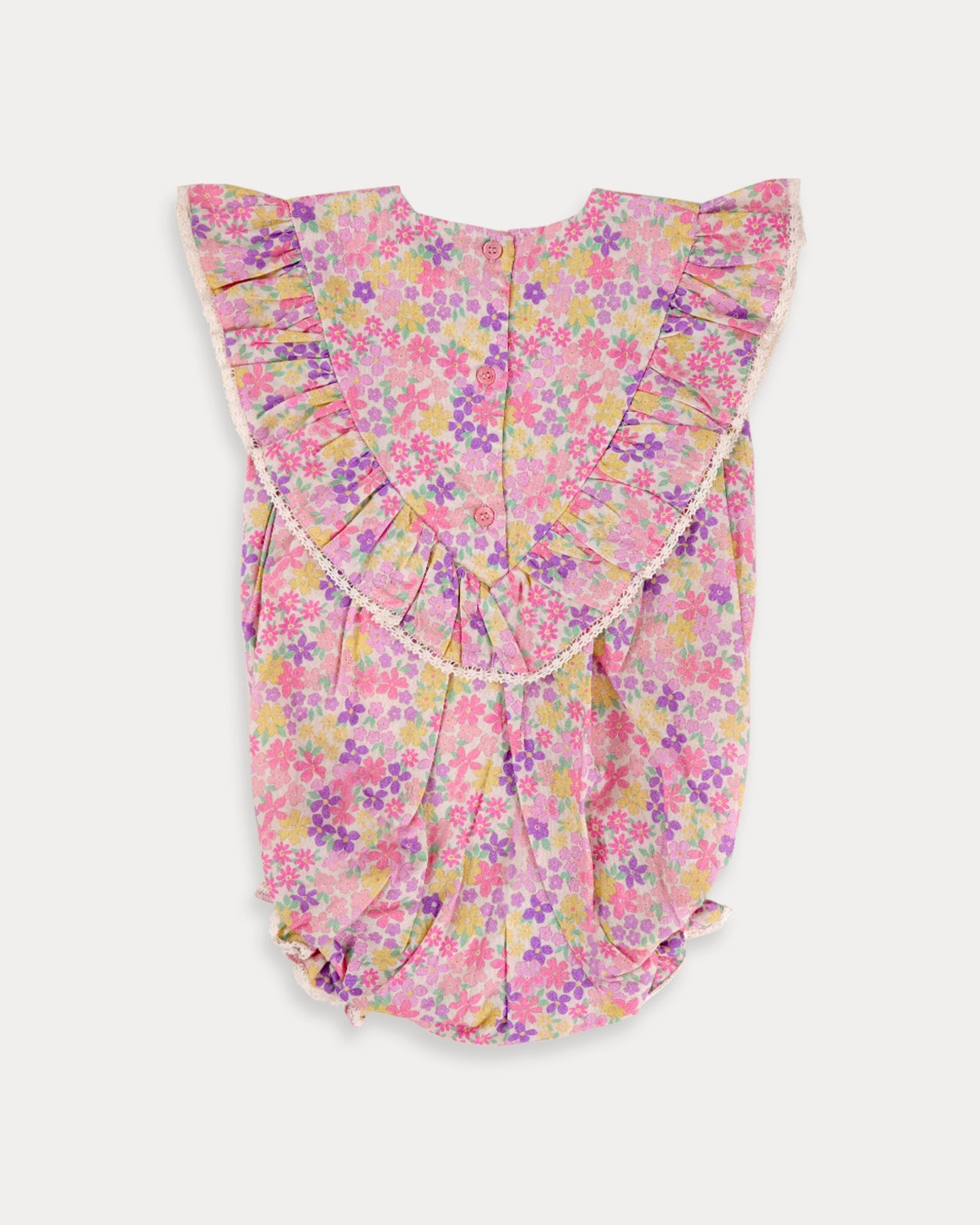Early Sunday, Lucy Baby Bubble Romper in Emma Floral Purple color, made from 100% Organic Cotton 60s Cambric fabric, featuring a floral print with lace borders, shown in a back flat-lay view