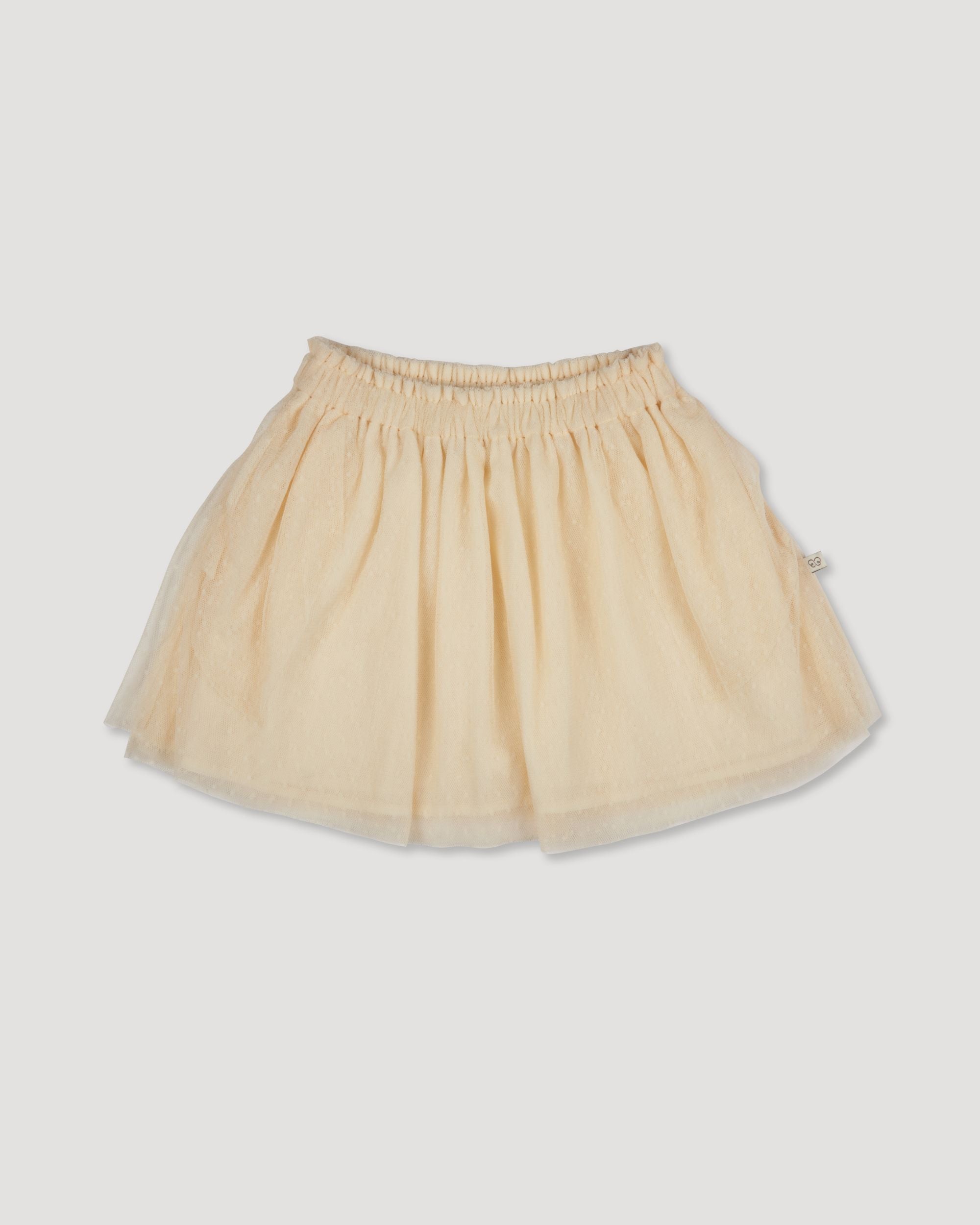 Early Sunday, Luna Skirt in Hazelnut Cream, made from Dyed Nylon Mesh Dobby fabric, featuring Elegant flow and gentle movement for everyday magic, shown in a front flat-lay view