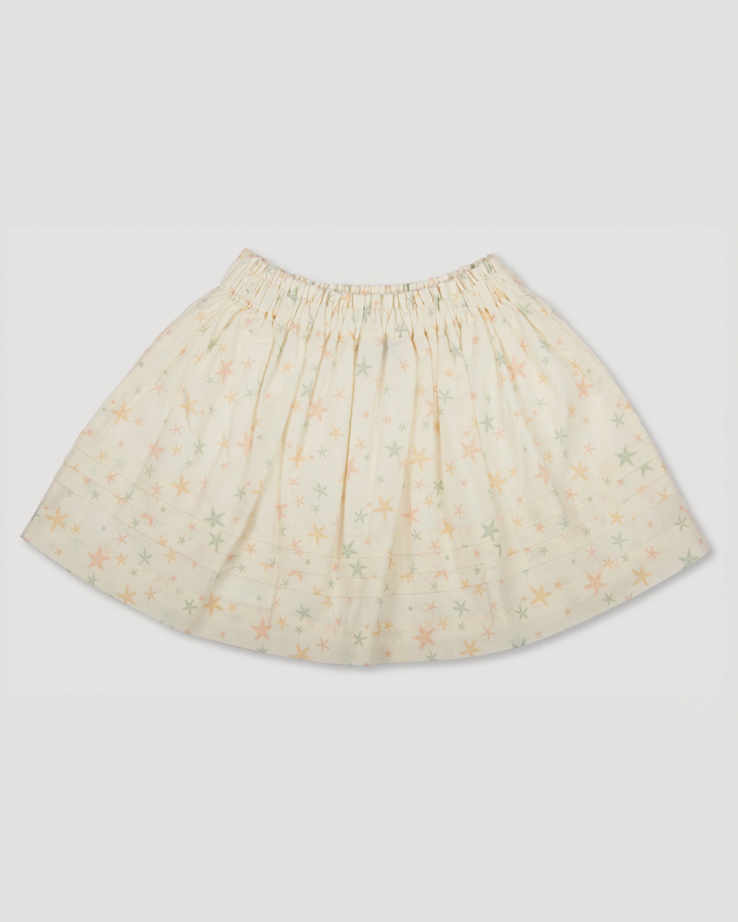 Early Sunday, Luna Skirt in Star Fish print, made from Printed Cotton Cambric fabric, featuring flattering silhouette with an easy fit, shown in a back flat-lay view