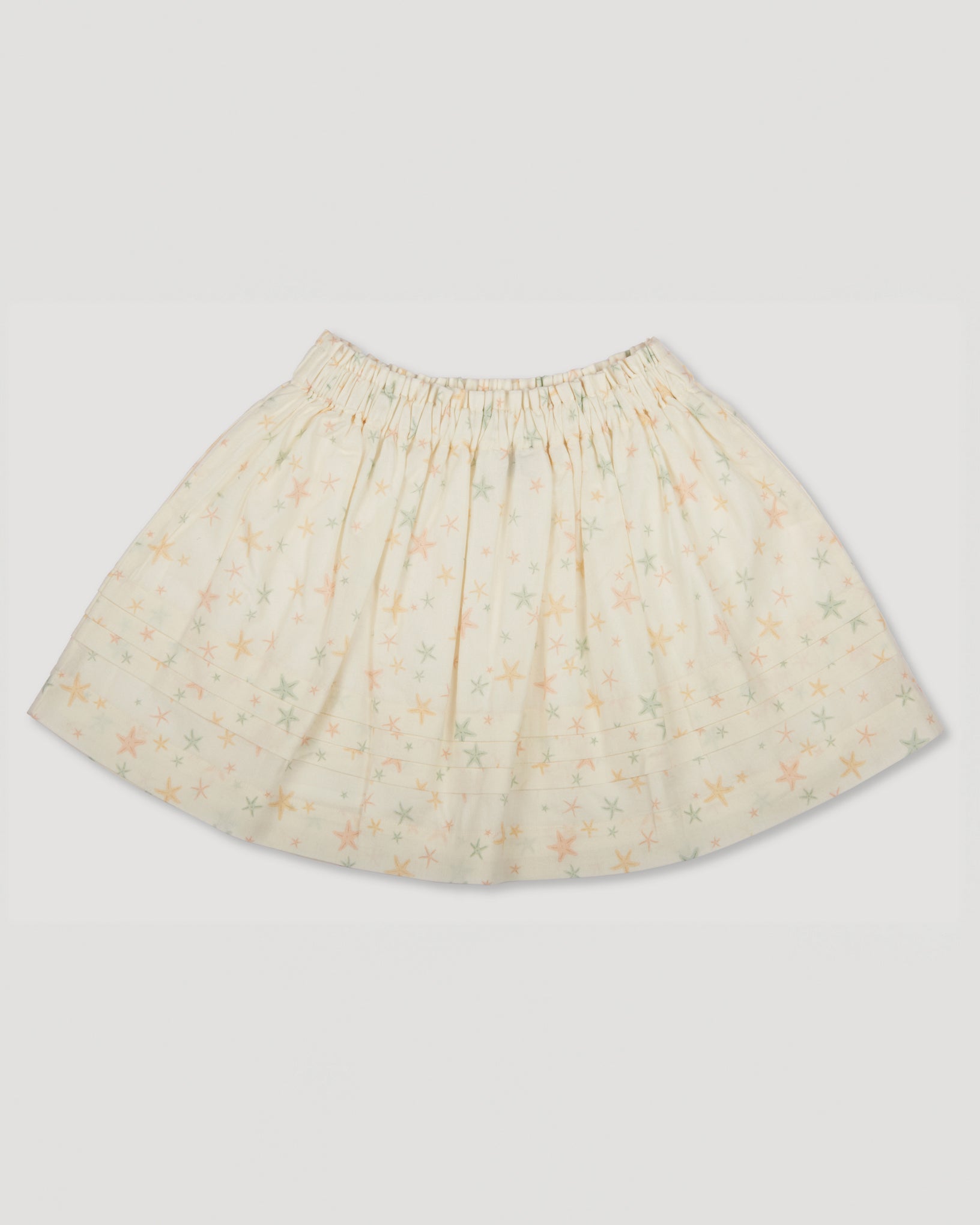 Early Sunday, Luna Skirt in Star Fish print, made from Printed Cotton Cambric fabric, featuring flattering silhouette with an easy fit, shown in a back flat-lay view