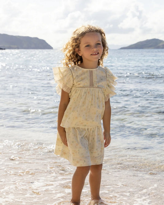 Early Sunday, Luna Skirt in Star Fish print, made from Printed Cotton Cambric fabric, featuring flattering silhouette with an easy fit, shown in a front view of model wearing it