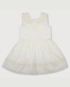 Early Sunday, LYS Dress in Ivory color, made from Cotton Dobby Swiss Dots fabric, featuring flattering fit with delicate finishes, combining style and functionality for an effortlessly elegant look, shown in a front flat-lay view