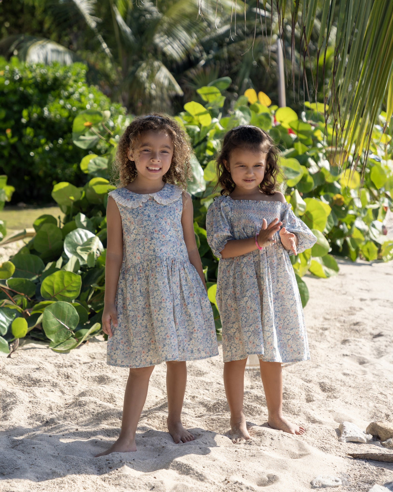 Early Sunday, LYS Dress in Amelia print, made from Printed Cotton Cambric fabric, featuring flattering fit with delicate finishes, shown in a front view of models wearing outdoors