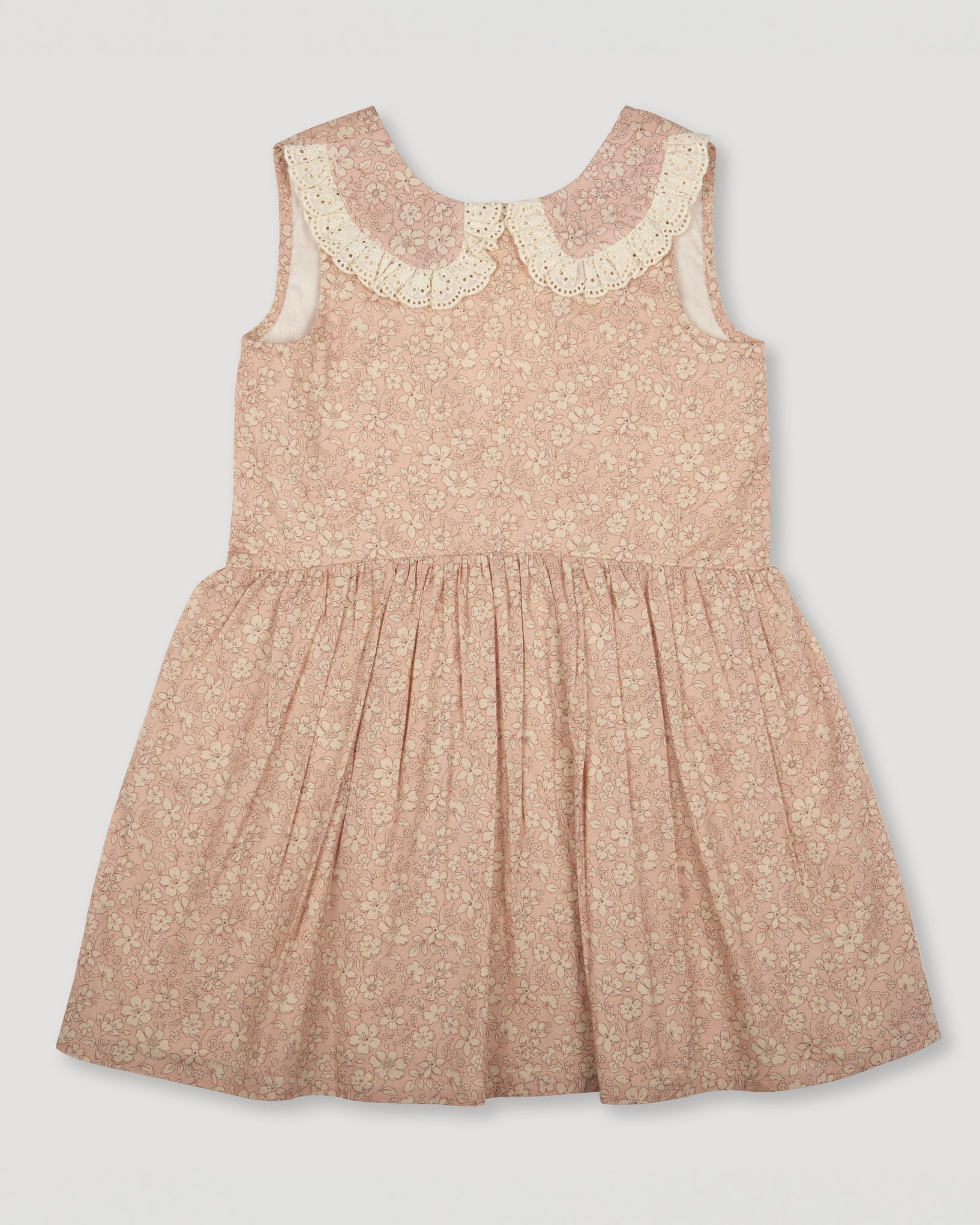 Early Sunday, LYS Dress in Garden Flowers print, made from Printed Cotton Cambric fabric, featuring flattering fit with delicate finishes, combining style and functionality for an effortlessly elegant look, shown in a front flat-lay view