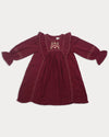 Early Sunday, Margot Dress in Plum, made from Cotton Double Gauze fabric, featuring classic silhouette with ruffle detailing around the sleeves, shown in a front flat-lay view