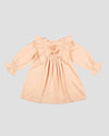Early Sunday, Margot Dress in Beige, made from Cotton Satin fabric, featuring classic silhouette with floral embroidery around the yoke and ruffle detailing, shown in a front flat-lay view
