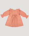 Early Sunday, Margot Dress in Earthy Pink, made from Cotton Satin fabric, featuring classic silhouette with floral embroidery around the yoke and ruffle detailing, shown in a back flat-lay view