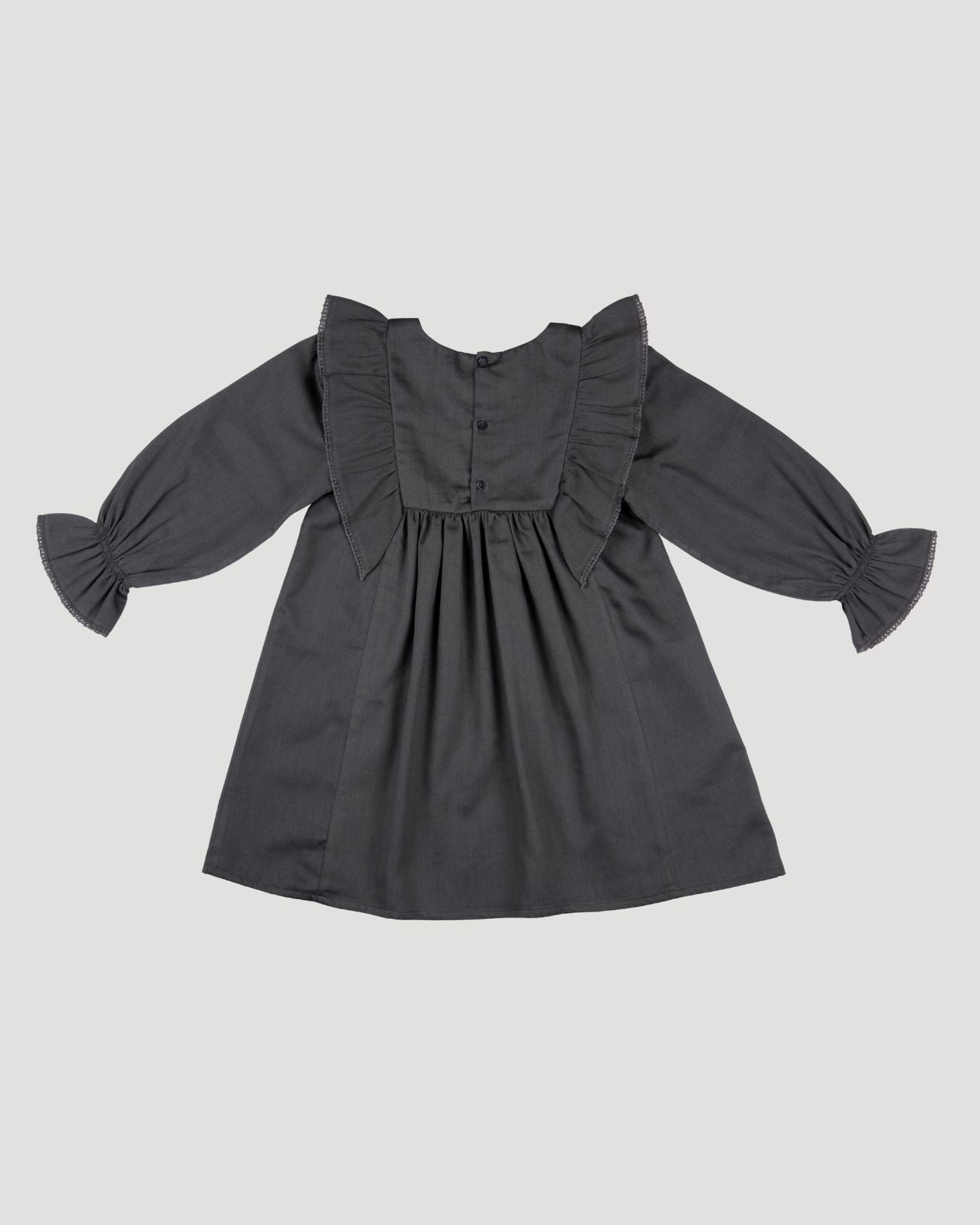 Early Sunday, Margot Dress in Stormy Blue, made from Cotton Satin fabric, featuring classic silhouette with floral embroidery around the yoke and ruffle detailing, shown in a back flat-lay view
