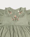 Early Sunday, Marguerite Dress in Sage Green, made from Viscose Drapey Twill fabric, featuring floral embroidery with frilled Peter Pan collar and gathered sleeves, shown in a closeup flat-lay view