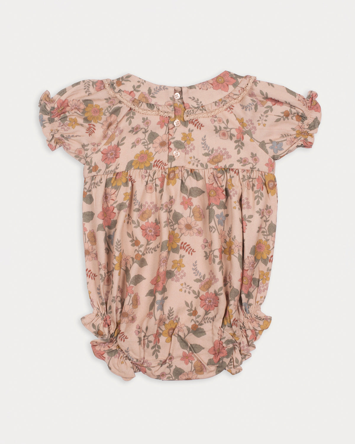 Early Sunday, Mathilda Baby Bubble Romper in Bloom, made from Printed Viscose Twill fabric, featuring a frilly peter pan collar with gathered sleeves, shown in a back flat-lay view