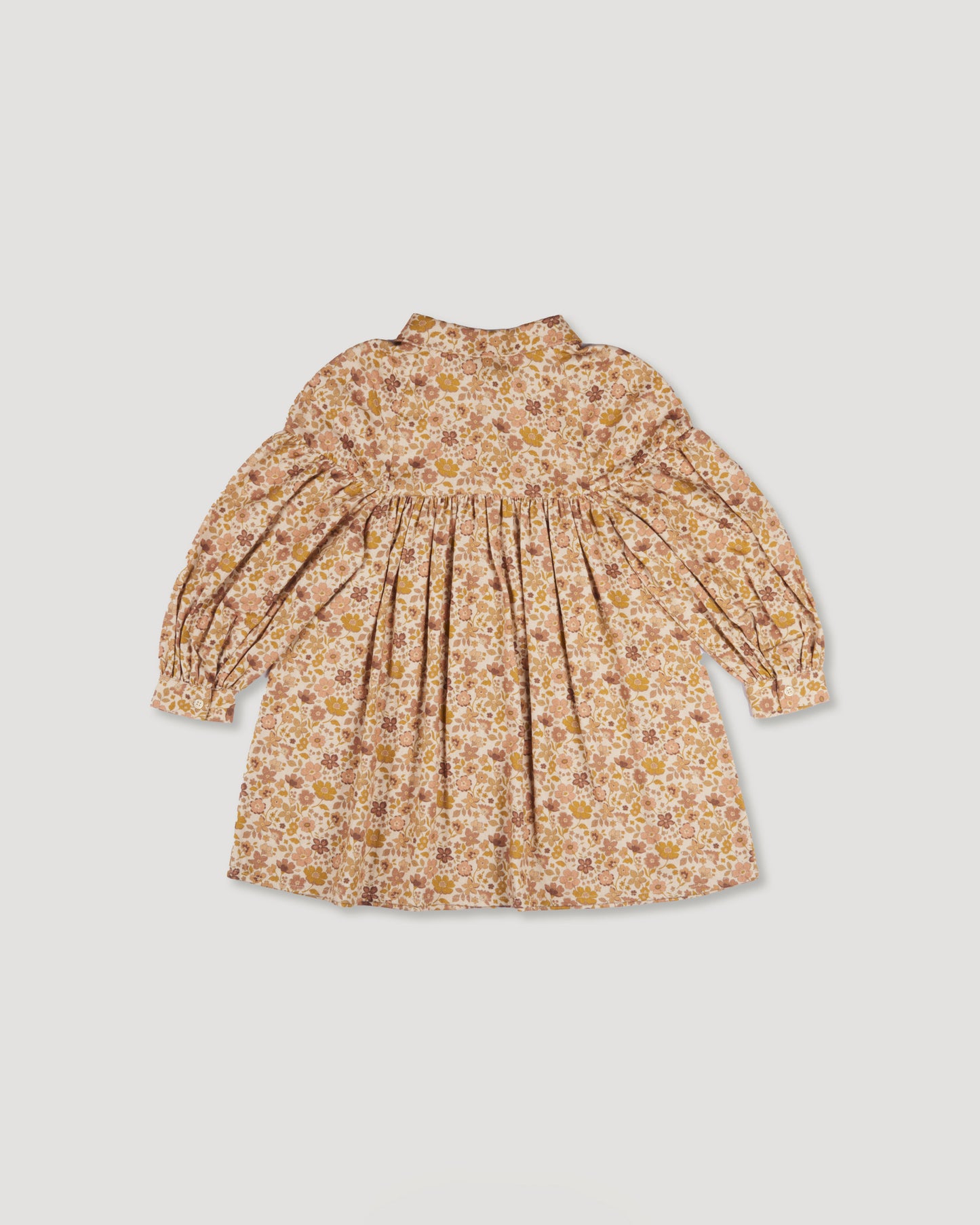 Early Sunday, Melanie Dress in Garden Flowers Dusty Pink, made from Printed Cotton Satin fabric, featuring classic silhouette with a collar, shown in a back flat-lay view