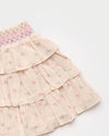 Early Sunday, Melissa Skirt in Butterflies print, made from Printed Cotton Tiny Swiss Dobby fabric, featuring tiered frilly skirt with smocked waistband, shown in a closeup flat-lay view