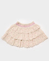 Early Sunday, Melissa Skirt in Butterflies print, made from Printed Cotton Tiny Swiss Dobby fabric, featuring tiered frilly skirt with smocked waistband, shown in a front flat-lay view