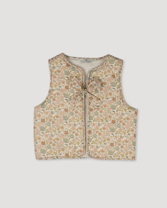 Early Sunday, Milly Baby Quilted Gilet (Reversible) in Garden Flowers print, made from Printed Cotton Cambric fabric, featuring reversible design for versatile styling, shown in a front flat-lay view