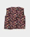 Early Sunday, Milly Baby Quilted Gilet in Garden Flowers Plum, made from Printed Cotton Satin fabric, featuring a sleeveless jacket with a bow tie, shown in a back flat-lay view