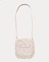 Early Sunday, Miss Sunday Sling in Painted Bouquet print, made from 70% Cotton, 30% Linen fabric, featuring a frill detailed sling purse with flap closure, shown in a back flat-lay view