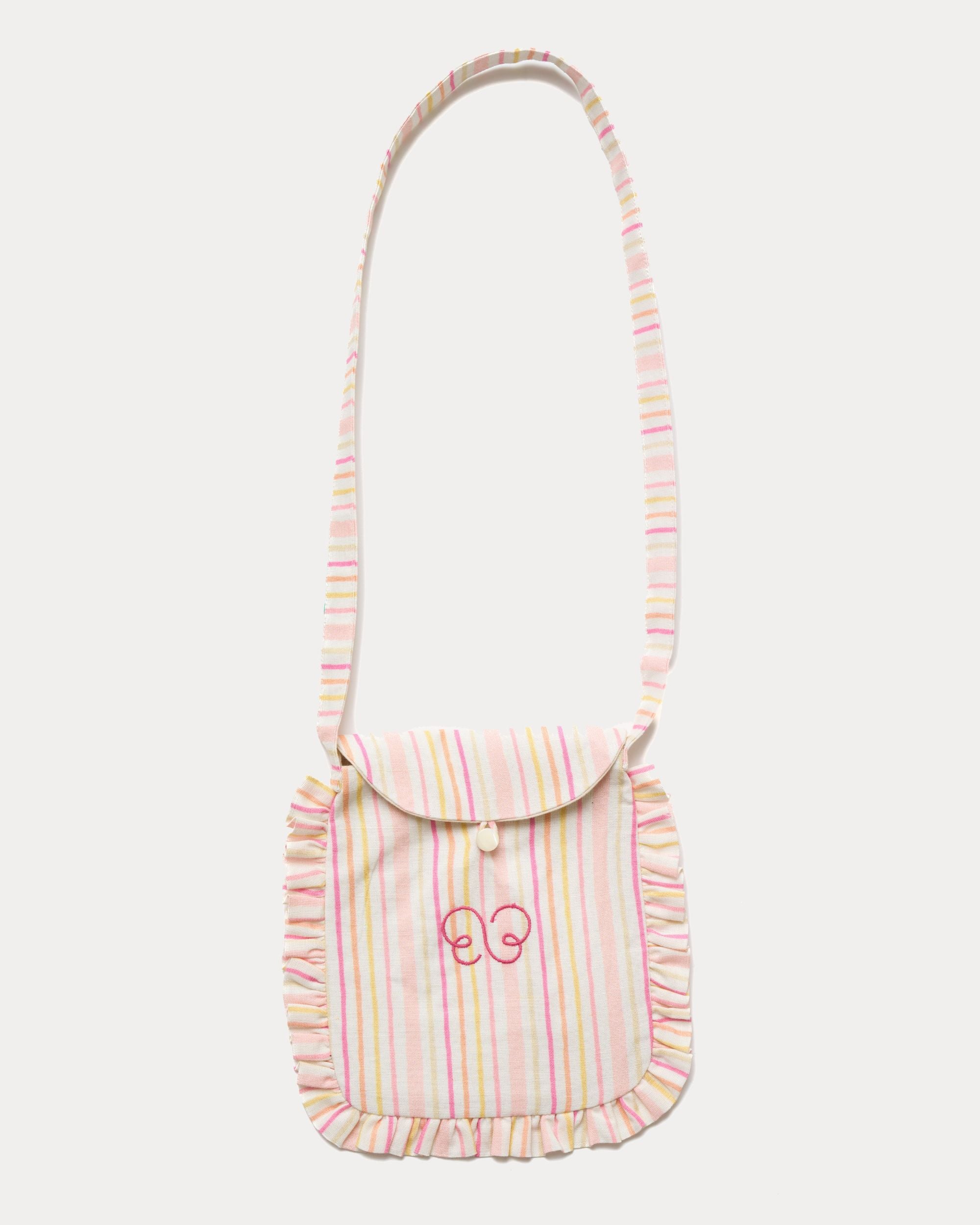 Early Sunday, Miss Sunday Sling in Pink Stripes print, made from 70% Cotton, 30% Linen fabric, featuring a frill detailed sling purse with flap closure, shown in a front flat-lay view